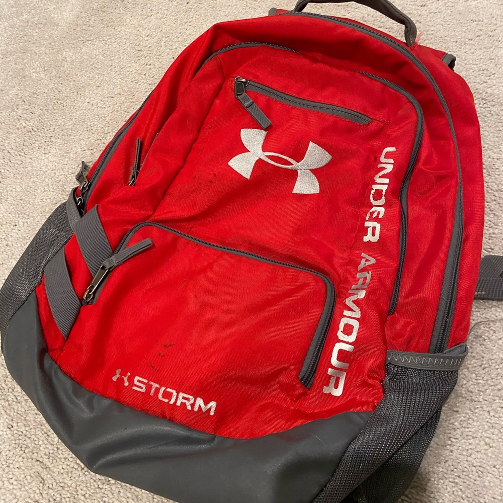 Under armor, red book bag